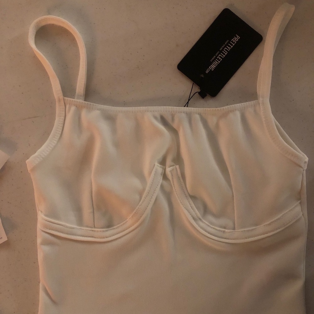 Never worn white bustier style top.